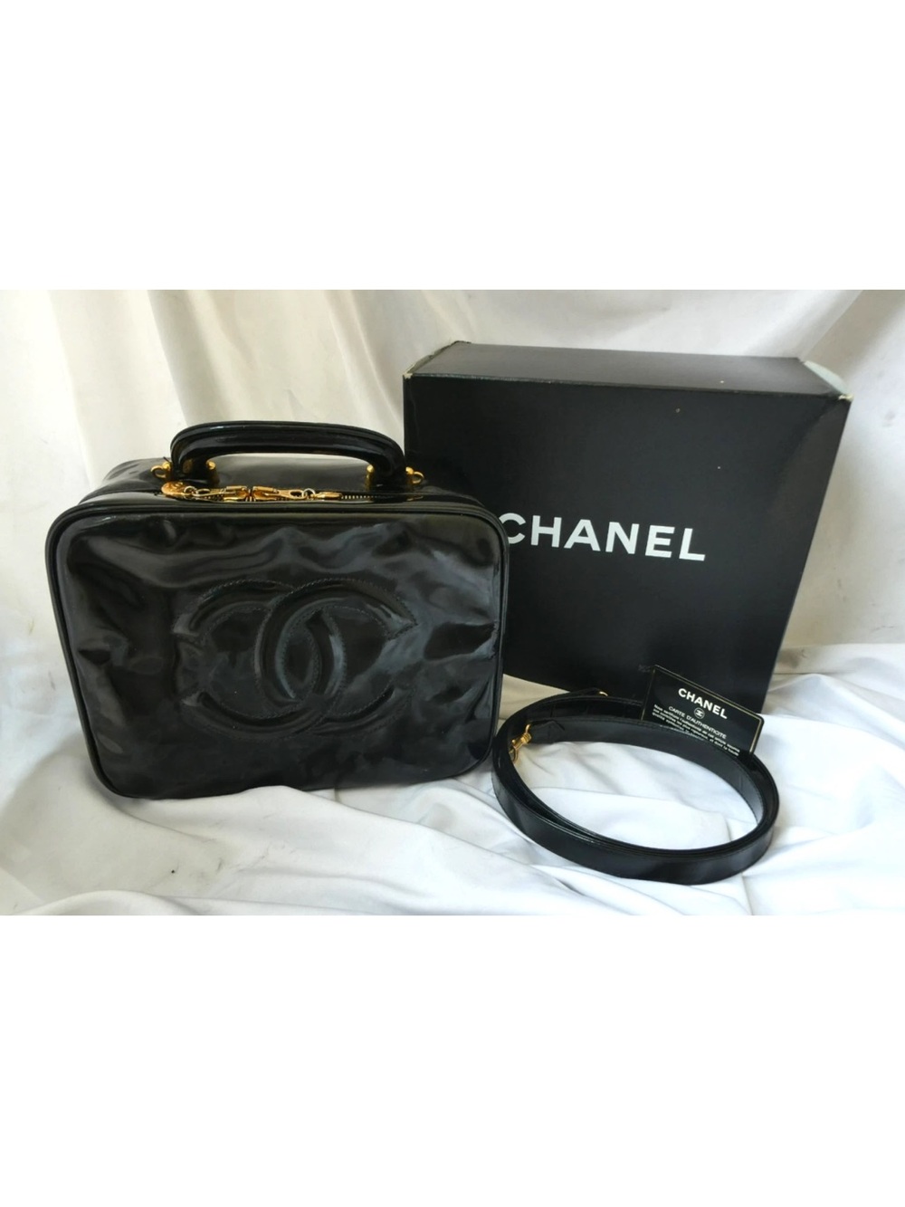 CHANEL Black Patent Mini Vanity Bag with Gold Hardware and Detachable Strap